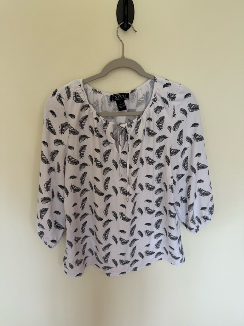 New York & Company White Blouse with Black Feather Print